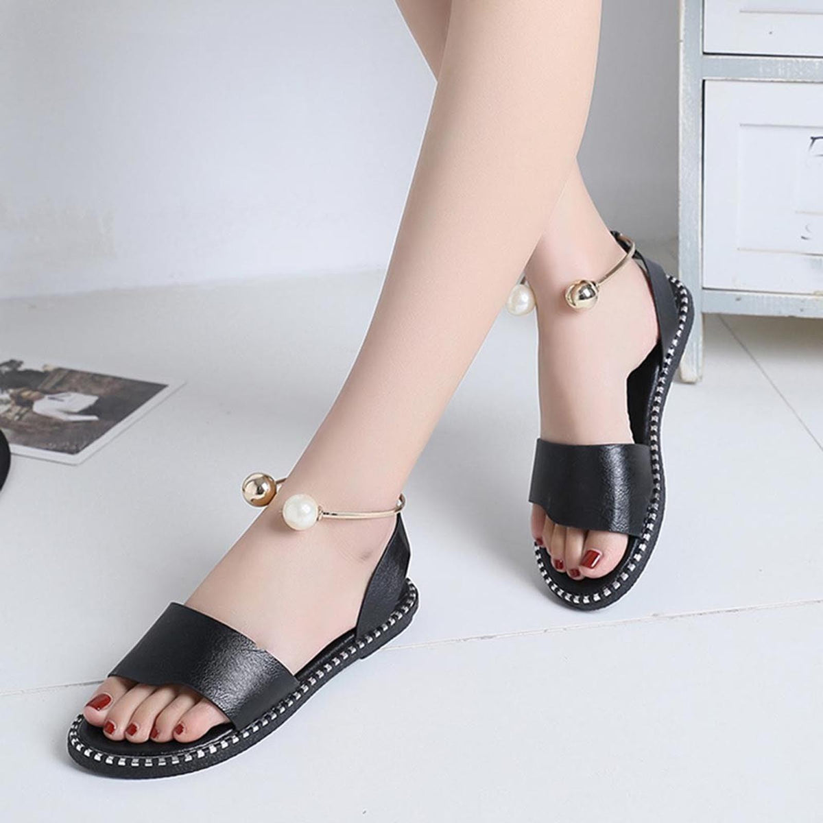 Stevvex women's black sandals with pearl ankle strap and gold bead, studded sole on Tampa Home & Garden Store