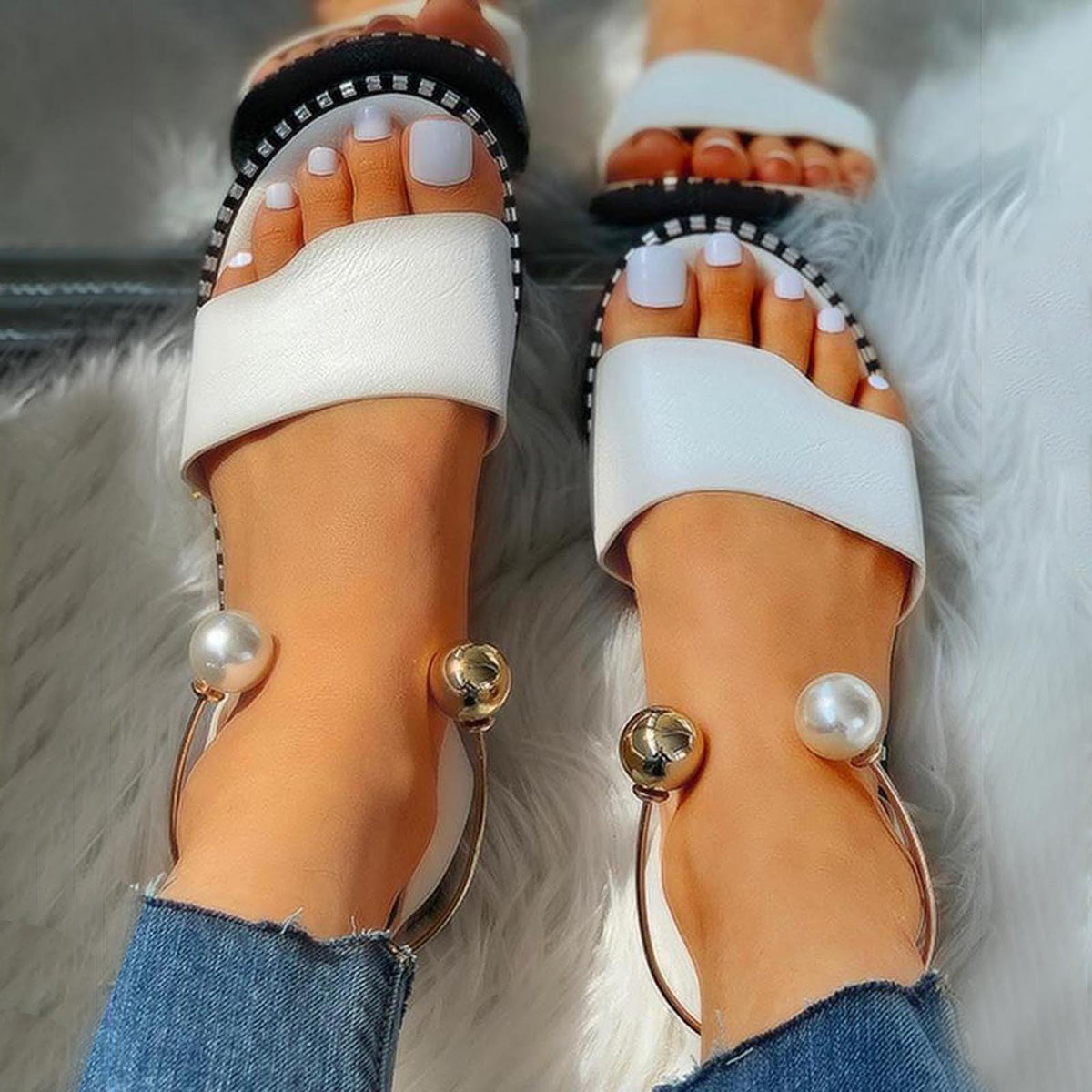 White sandals pair with wide front strap, pearl accents, rounded toe, casual non-slip sole on Tampa Home & Garden Store