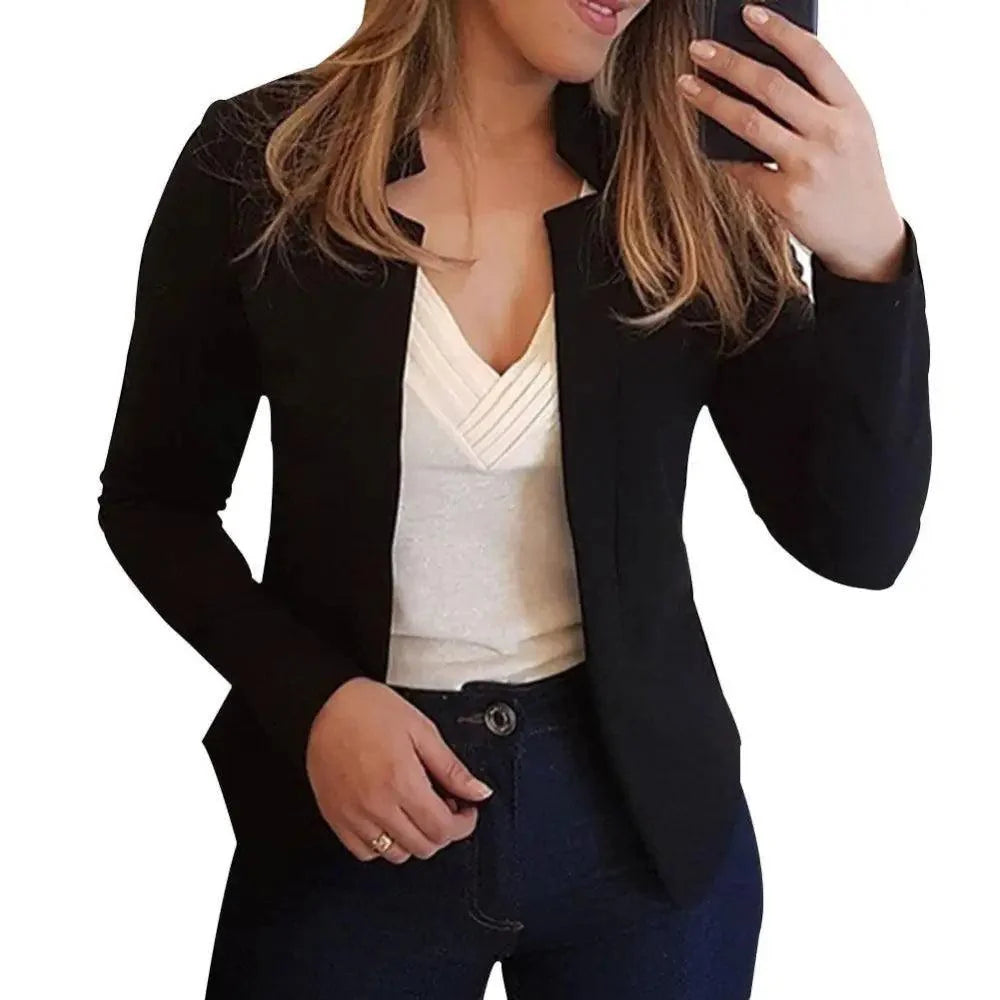 Stevvex black blazer with long sleeves over white V-neck top, office-ready on Tampa Home & Garden Store