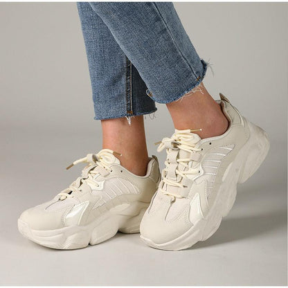 Cream lace-up platform sneakers pair with chunky sole leather upper on Tampa Home & Garden Store