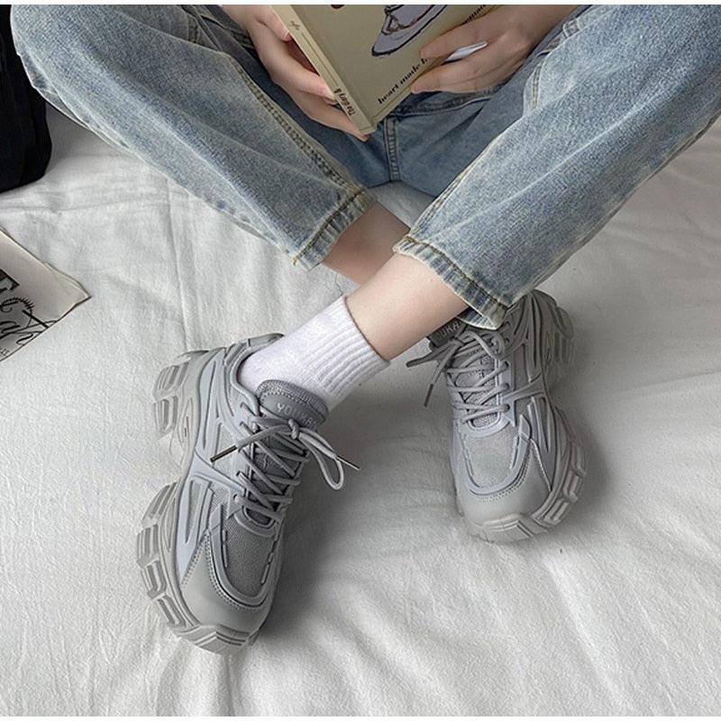 Elegant women's gray faux leather lace-up platform sneakers with chunky sole on Tampa Home & Garden Store
