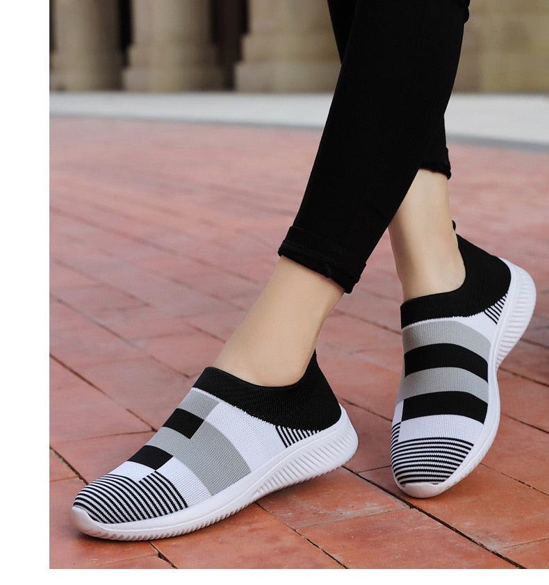 Women's knitted slip-on sneakers Stevvex, black gray white striped mesh upper, white sole on Tampa Home & Garden Store