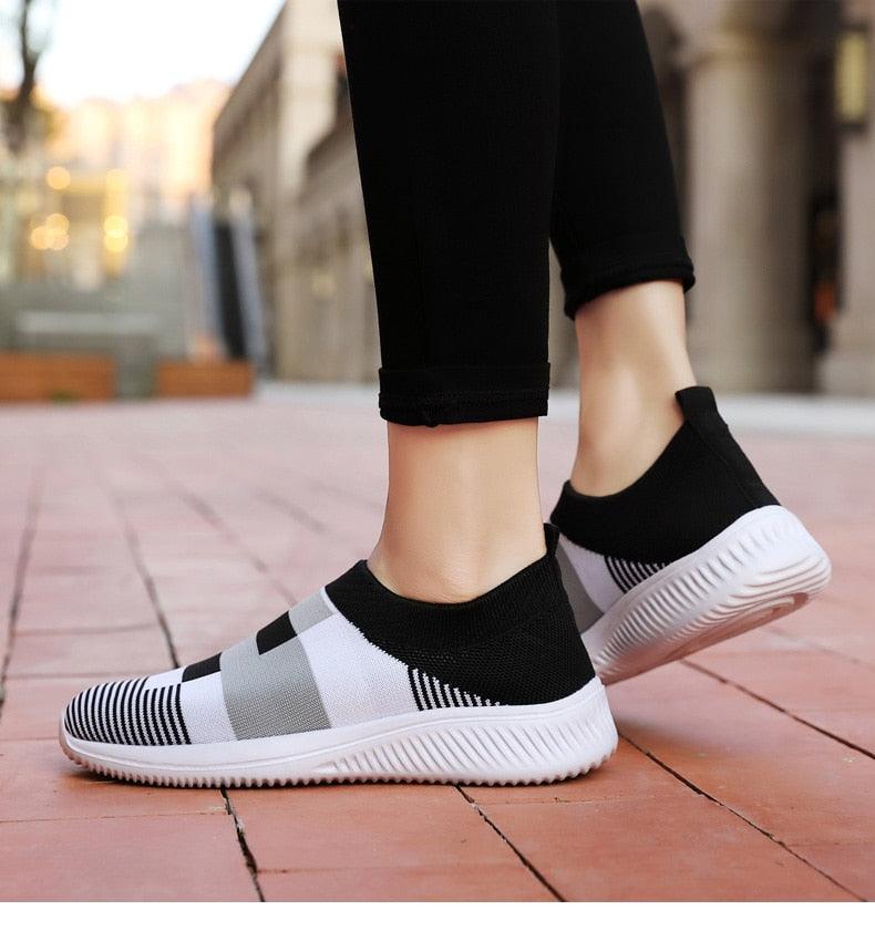 Stevvex knitted slip-on sneakers, black and white mix, breathable mesh upper, white sole on Tampa Home & Garden Store