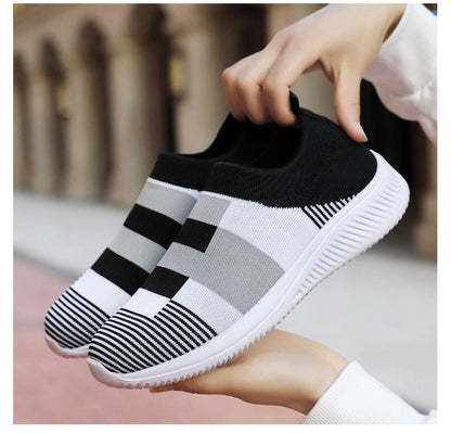 Stevvex women's knit slip-on sneakers pair in black white gray with striped knit pattern on Tampa Home & Garden Store
