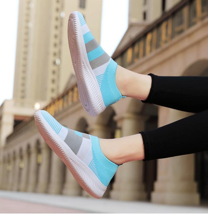 Stevvex women's knitted slip-on sneakers, light blue gray striped mesh with white sole, pair on Tampa Home & Garden Store