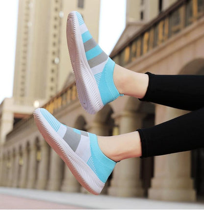 Stevvex women's knitted slip-on sneakers, light blue gray striped mesh with white sole, pair on Tampa Home & Garden Store