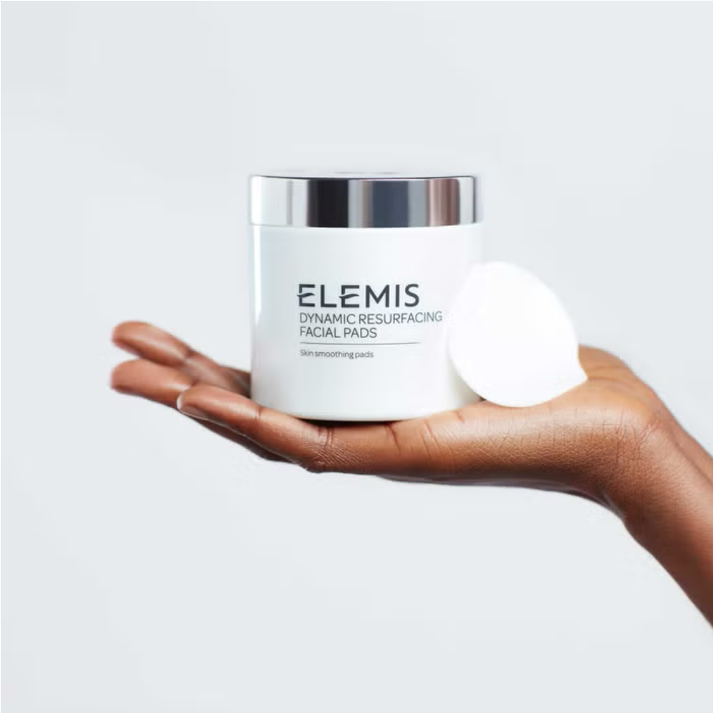 Elemis Dynamic Resurfacing Facial Pads 60pk white jar with silver lid held in palm on Tampa Home & Garden Store