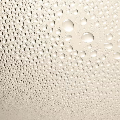 Elemis Soothing Apricot Toner 200ml close-up with water droplets on beige surface on Tampa Home & Garden Store