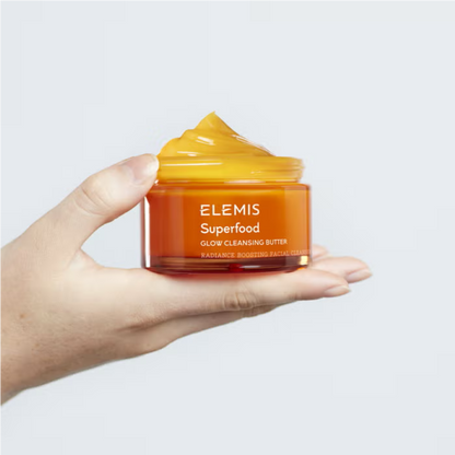 Elemis Superfood Glow Cleansing Butter 90 ml orange jar held in hand on Tampa Home & Garden Store