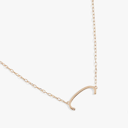 Alex and Ani Initial C Elongated Necklace goldtone with curved C pendant and small stone on Tampa Home & Garden Store