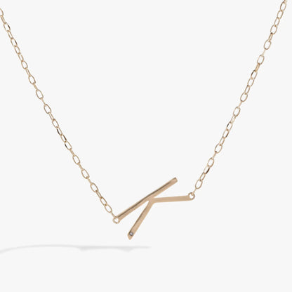 Initial K Precious Elongated Necklace with gold-tone chain and K pendant on Tampa Home & Garden Store