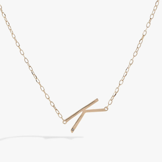 Initial K Precious Elongated Necklace with gold-tone chain and K pendant on Tampa Home & Garden Store