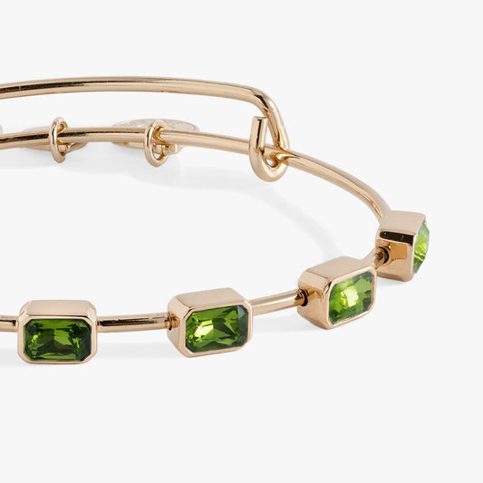 August Birthstone Emerald Cut Bangle by Alex and Ani with emerald-cut stones in gold links on Tampa Home & Garden Store