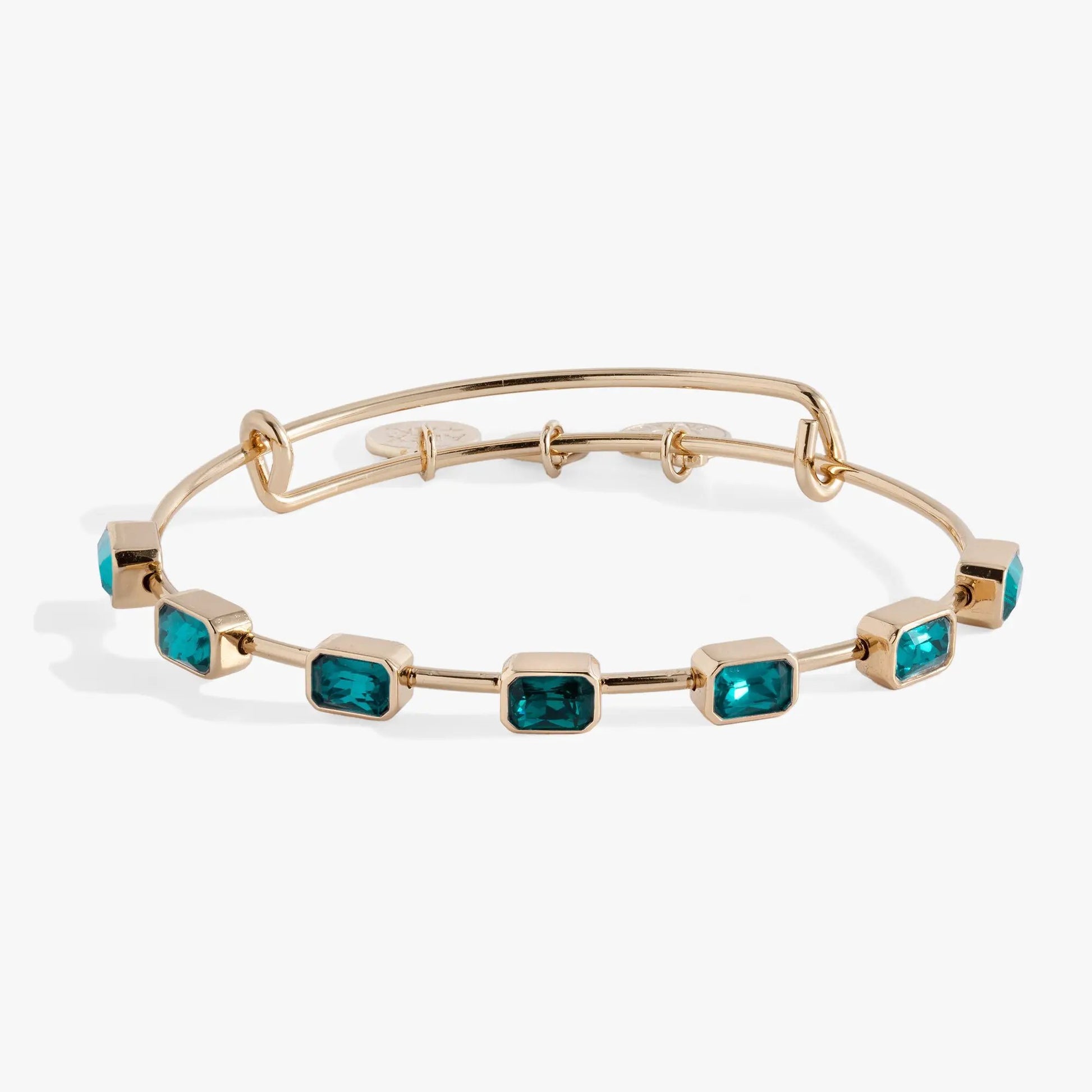 December Birthstone Emerald Cut Bangle by ALEX AND ANI with teal stones on gold-tone band on Tampa Home & Garden Store