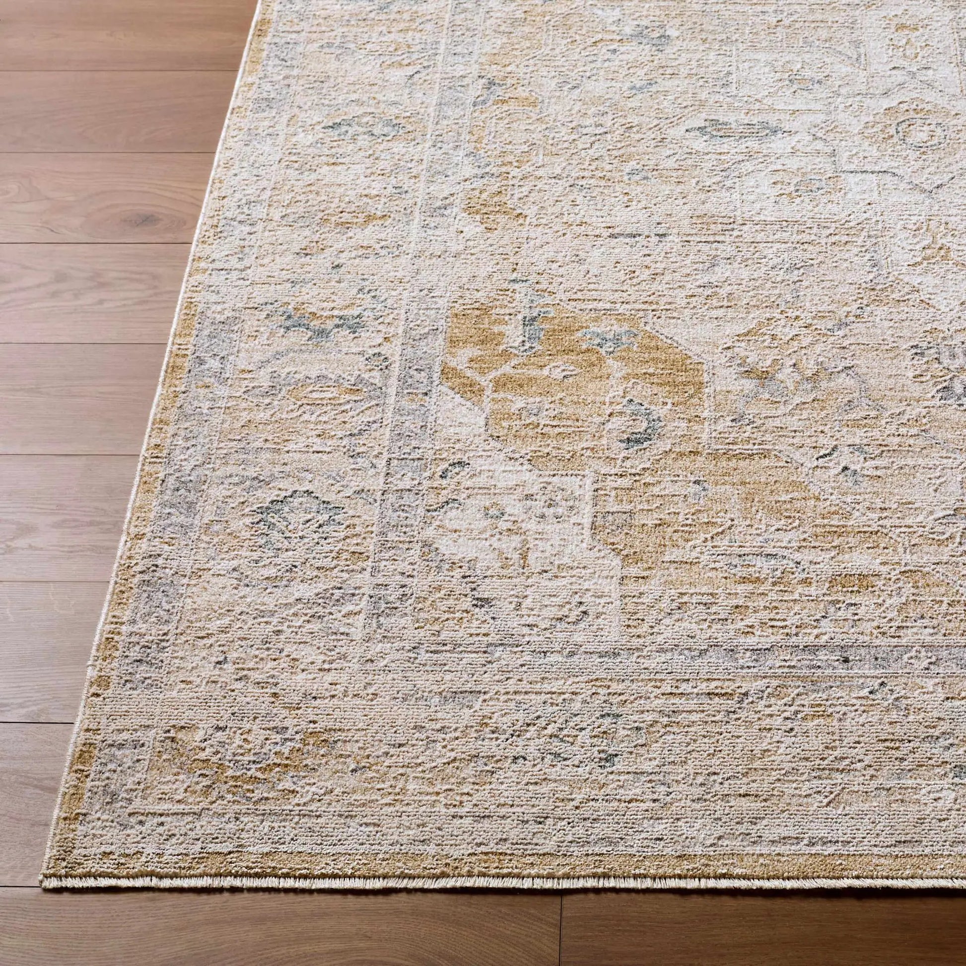 Rhody Luxe Rug - Clearance by Boutique Rugs, beige distressed area rug with cream highlights and fringe on Tampa Home & Garden Store