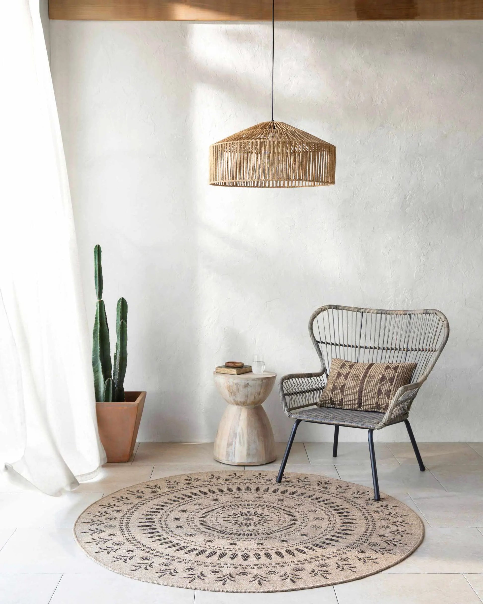 Beata Round Faux Jute Outdoor Rug natural beige woven circular design on Tampa Home & Garden Store