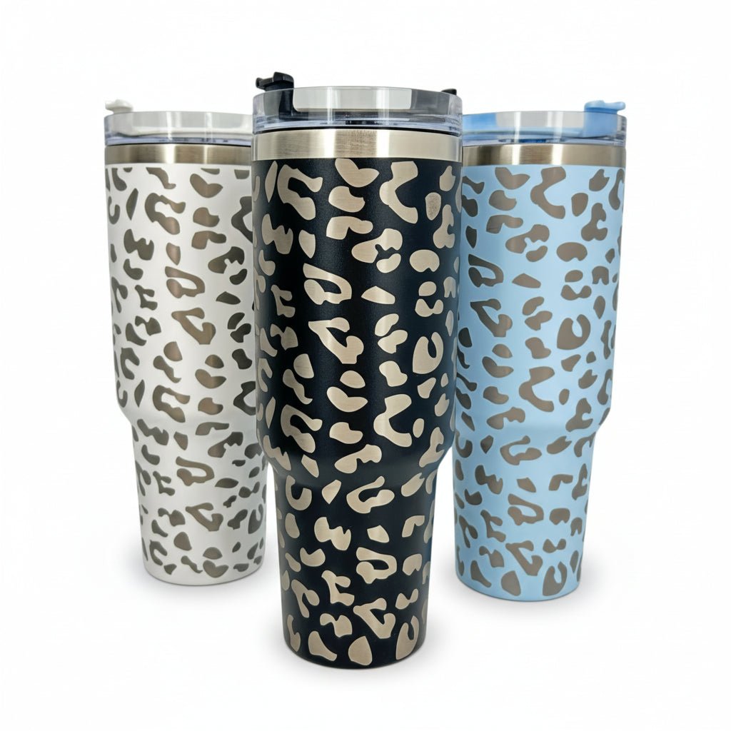Leopard print 40 oz stainless steel tumbler trio with handles and straw lids white, black, blue on Tampa Home & Garden Store