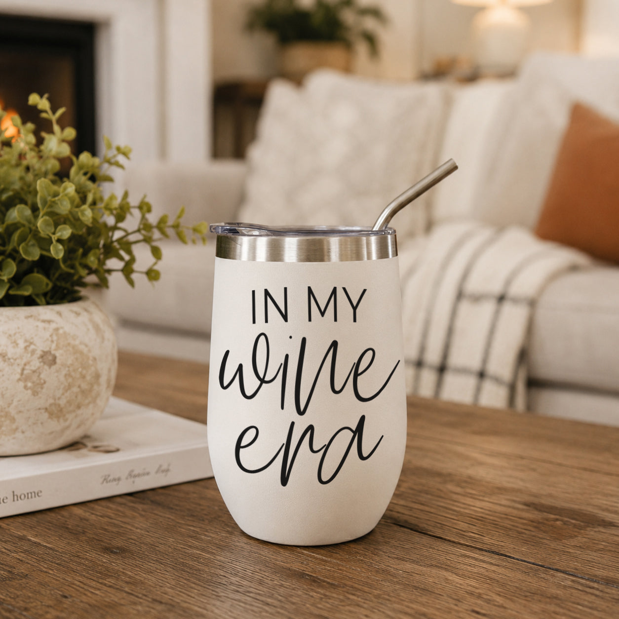 Gia Roma Wine Era 17oz tumbler white with black script, stainless lid and straw on wood table on Tampa Home & Garden Store