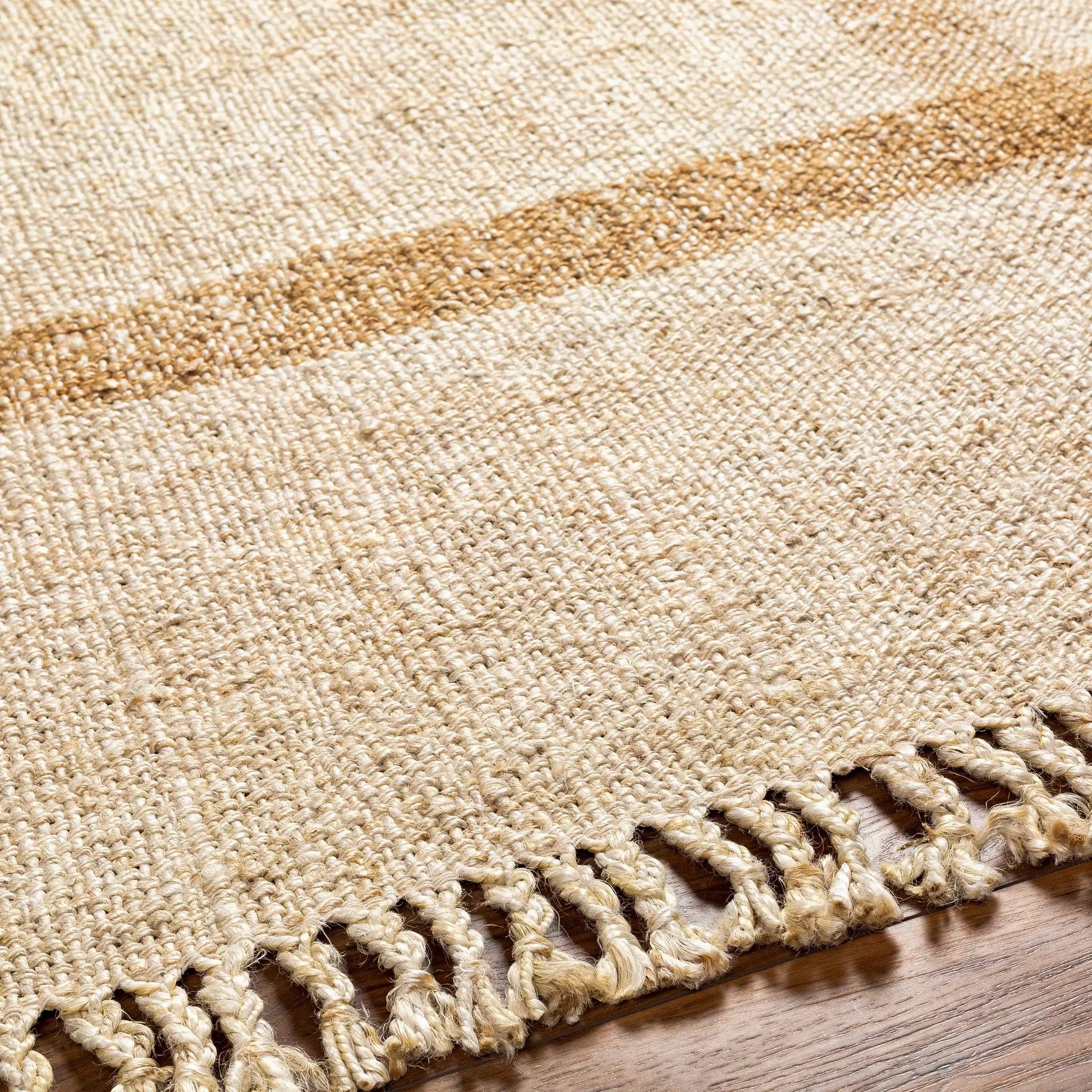 Errin Jute Area Rug natural beige with chunky woven texture and fringe by Boutique Rugs on Tampa Home & Garden Store