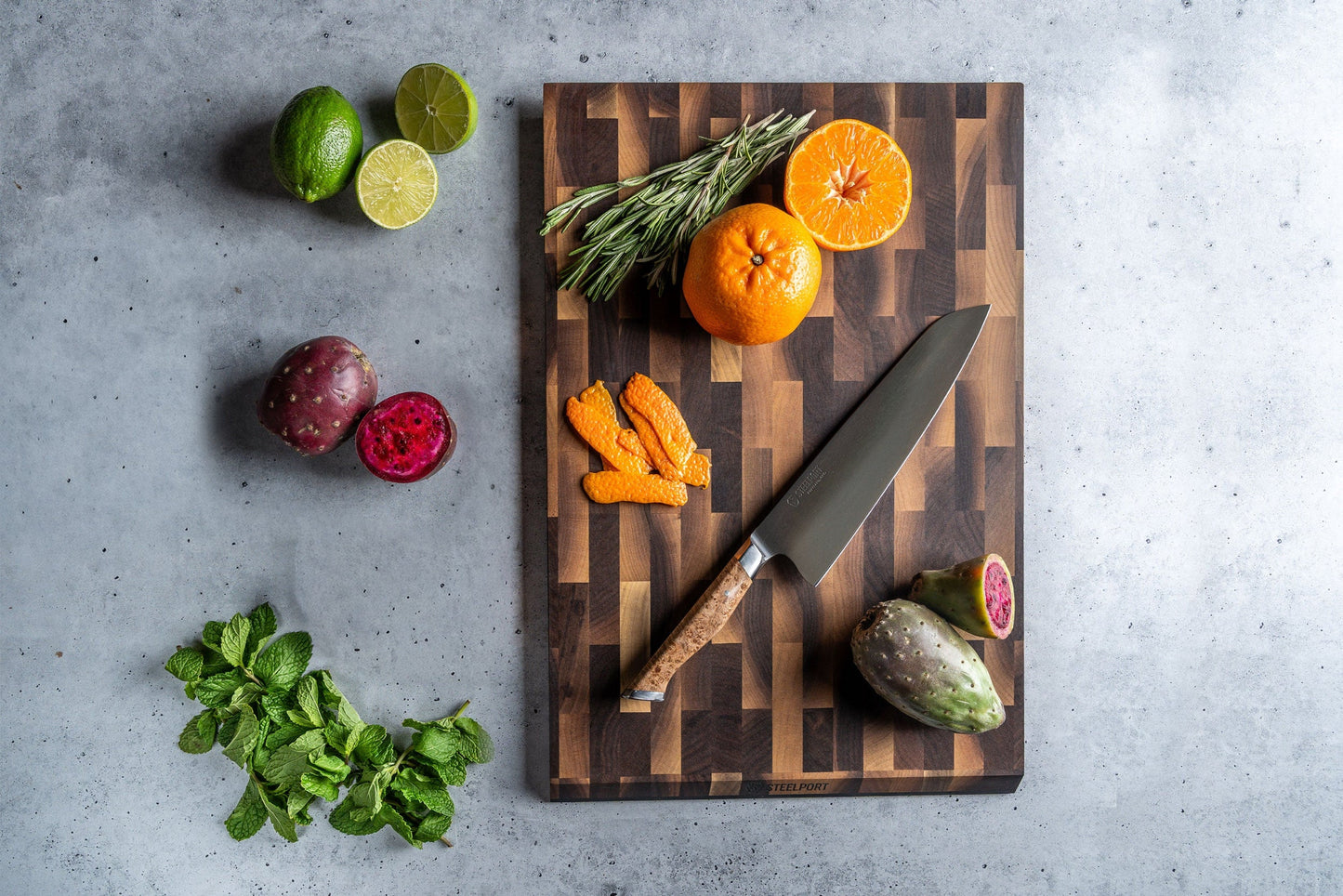 Everyday Knife & Board Set STEELPORT Knife Co. on a wood cutting board with knife on Tampa Home & Garden Store