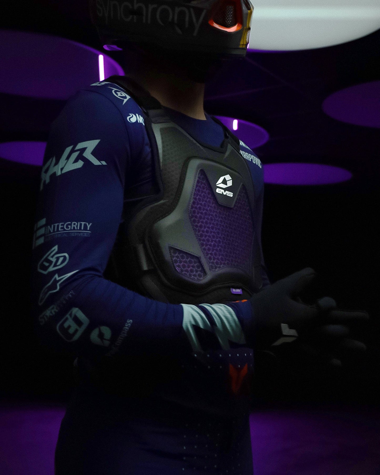 EVS Sports Evolution Chest Protector with purple mesh chest and black shell on rider on Tampa Home & Garden Store