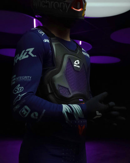 EVS Sports Evolution Chest Protector with purple mesh chest and black shell on rider on Tampa Home & Garden Store