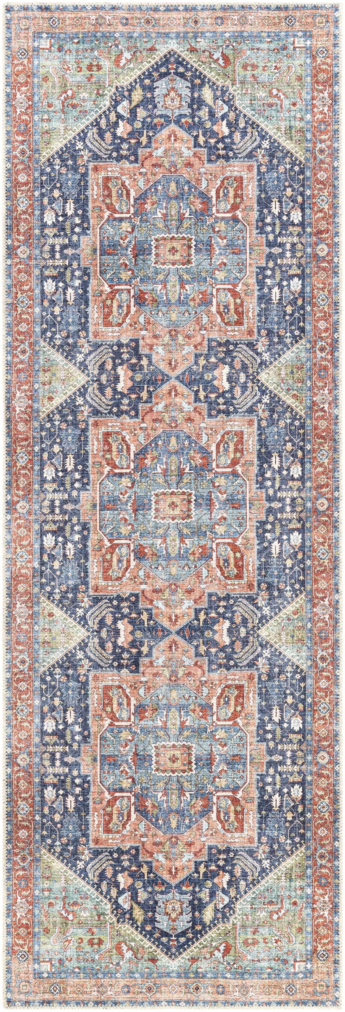 Exira washable area rug by Boutique Rugs with navy, coral and teal ornate medallion motif on Tampa Home & Garden Store