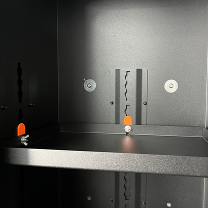 Avatar Additional Shelf for Storage Boxes add-on shelving inside a dark cabinet with orange pegs on Tampa Home & Garden Store