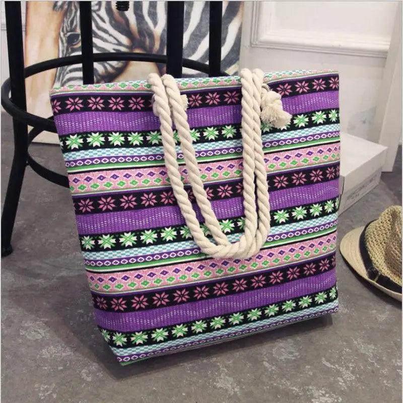 Folding floral canvas shoulder bag by Stevvex with multicolor stripes and thick rope handles on Tampa Home & Garden Store