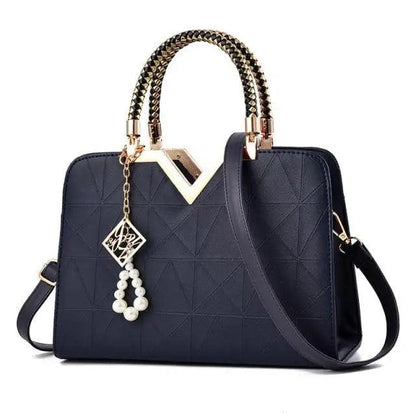 Stevvex navy leather satchel with geometric quilt, studded handles, gold V lock, phone pocket on Tampa Home & Garden Store