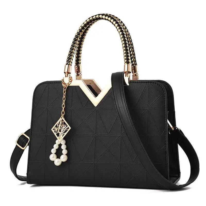 Satchel bag Stevvex black leather with pattern, gold handles, crossbody strap, pearl charm on Tampa Home & Garden Store