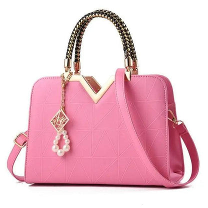Stevvex pink leather satchel bag with crossbody strap, studded handles, pearl charm on Tampa Home & Garden Store