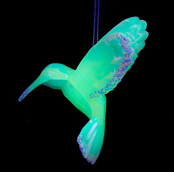 Adorno de colibrí que brilla en la oscuridad -