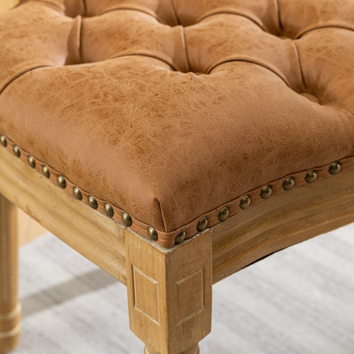 French style solid wood dining chair with tan leather upholstery, nailhead trim on legs on Tampa Home & Garden Store