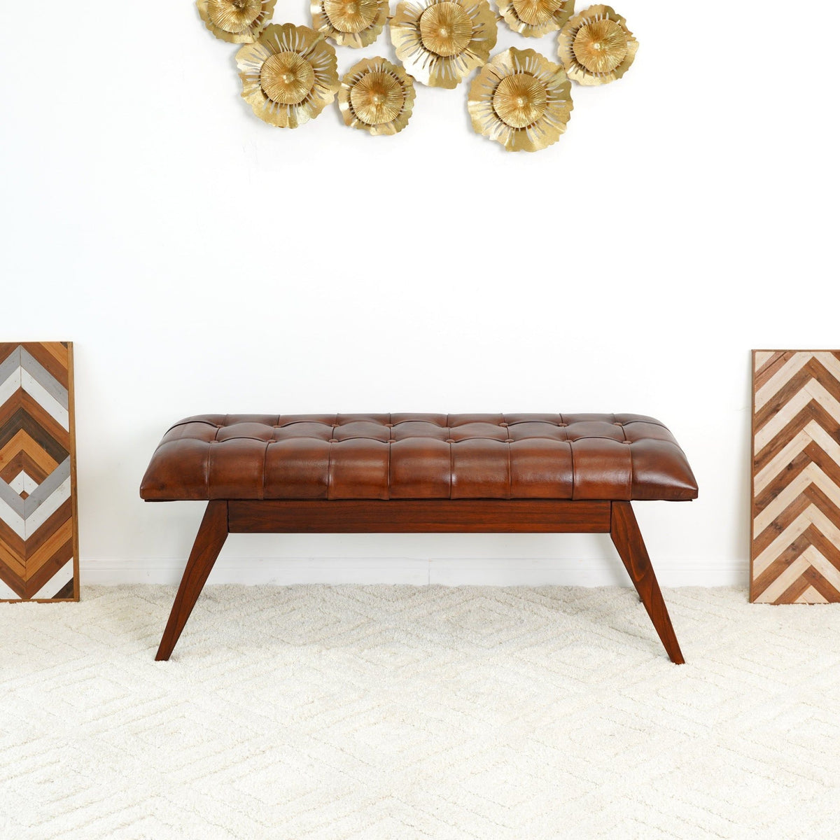 Cognac leather upholstered bench with solid dark wood frame and tufted cushion, tapered legs on Tampa Home & Garden Store
