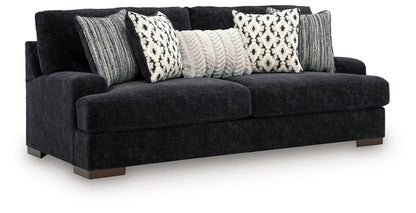 Whitmore Manor sofa in Black Pearl, charcoal velvet stationary sofa with striped pillows on Tampa Home & Garden Store