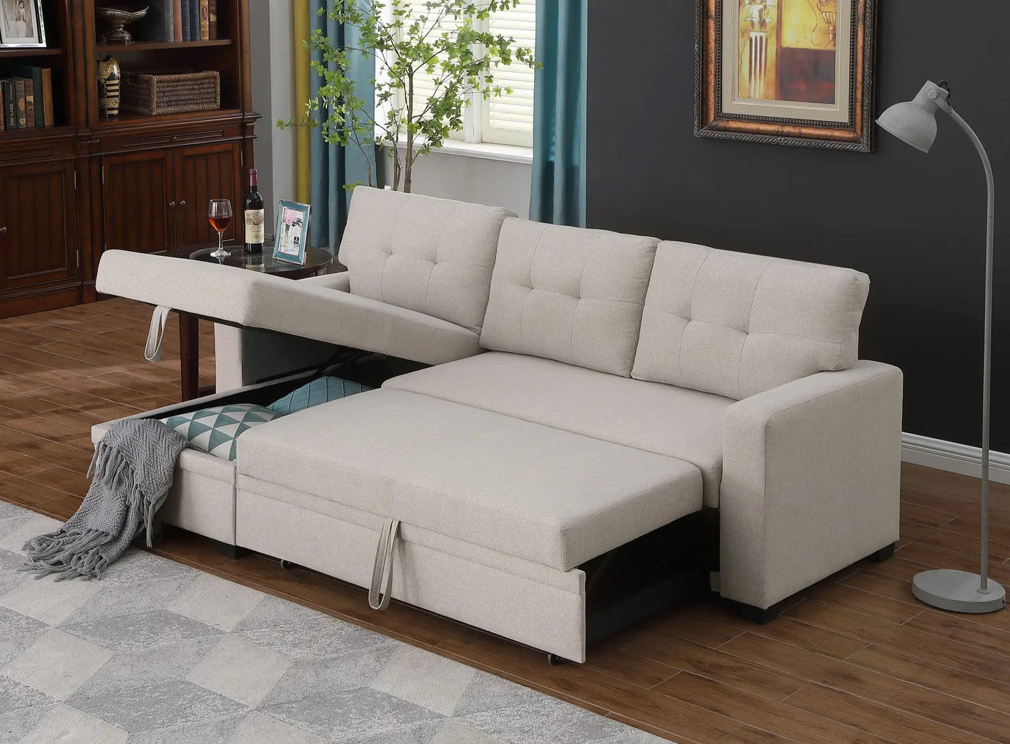 Upholstered pull-out sectional sofa with chaise in light beige fabric, tufted back cushions on Tampa Home & Garden Store