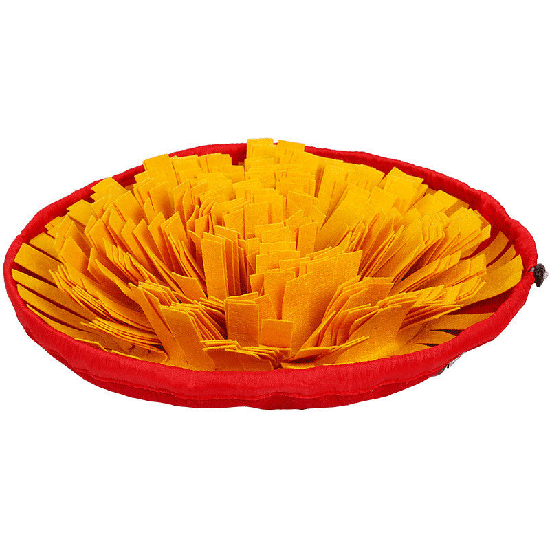Dog snuffle mat with red round base and yellow fleece strips for interactive puzzle feeding on Tampa Home & Garden Store