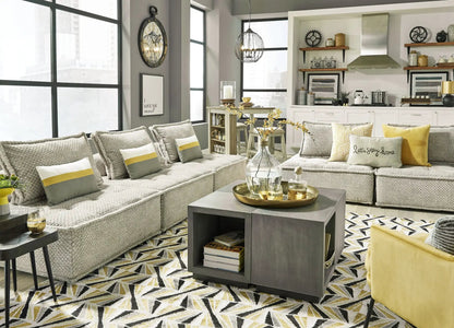 Bales Sectional sofa in light gray textured fabric with yellow pillows by Unique Piece Furniture on Tampa Home & Garden Store