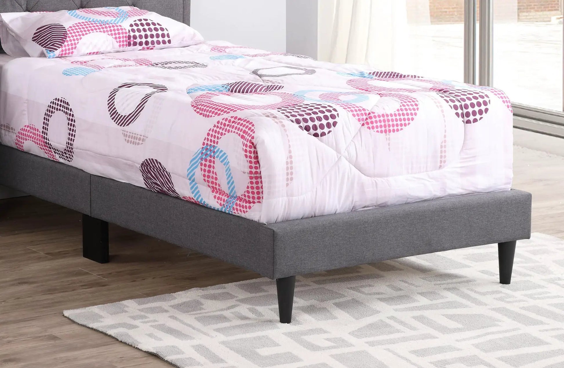 Button tufted upholstered bed in gray fabric with pink circles bedding by Unique Piece Furniture on Tampa Home & Garden Store