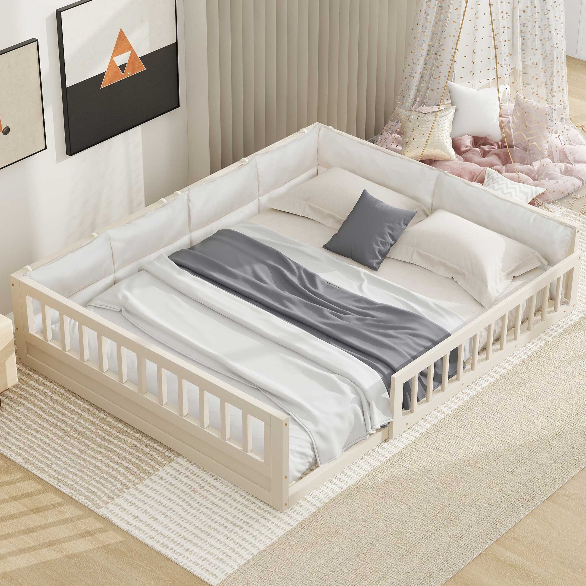 Platform beds with guardrails, two white frames dressed in gray bedding on Tampa Home & Garden Store