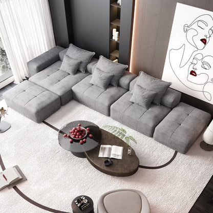 Modern oversized DIY modular sectional sofa in gray fabric with pillows, living room setup on Tampa Home & Garden Store