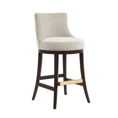 Bar height barstool with backrest in beige fabric, dark wood legs, brass footrest on Tampa Home & Garden Store