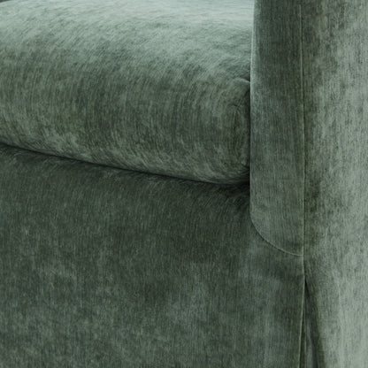 Skirted swivel accent chair fabric close-up in dark green velvet with tufting on Tampa Home & Garden Store