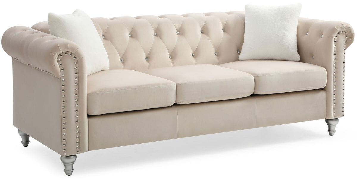 the Raisa Tufted Sofa and Nailhead Accents