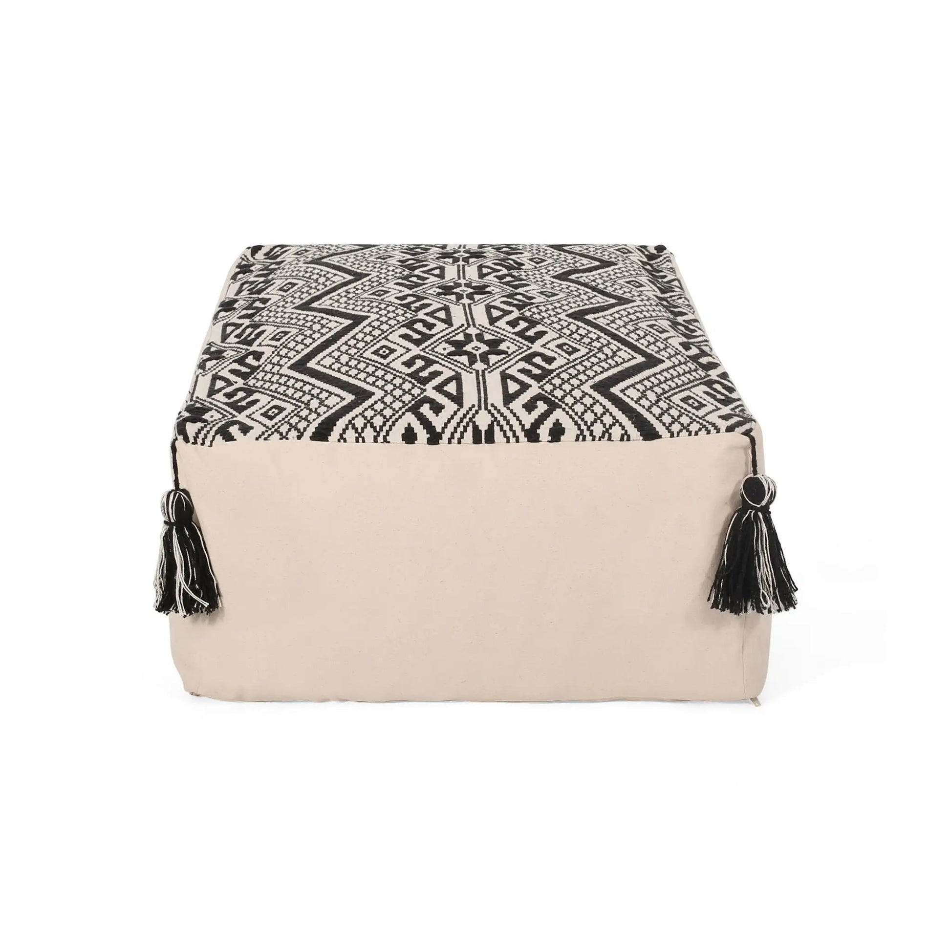 Kiki rectangular pouf ottoman with black geometric top and beige base with tassels on Tampa Home & Garden Store