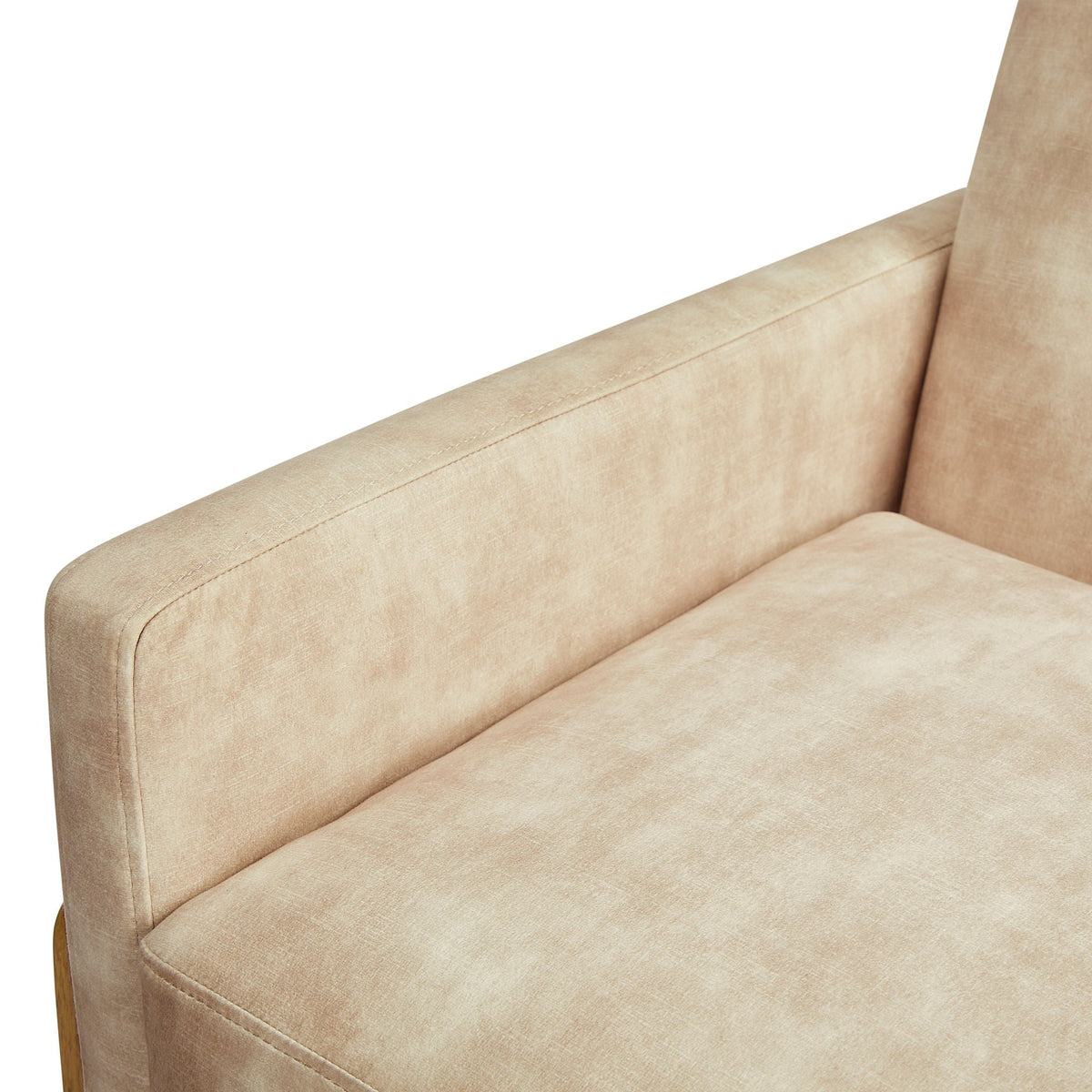 Accent arm chair in beige upholstery with visible stitched seams along the arm on Tampa Home & Garden Store