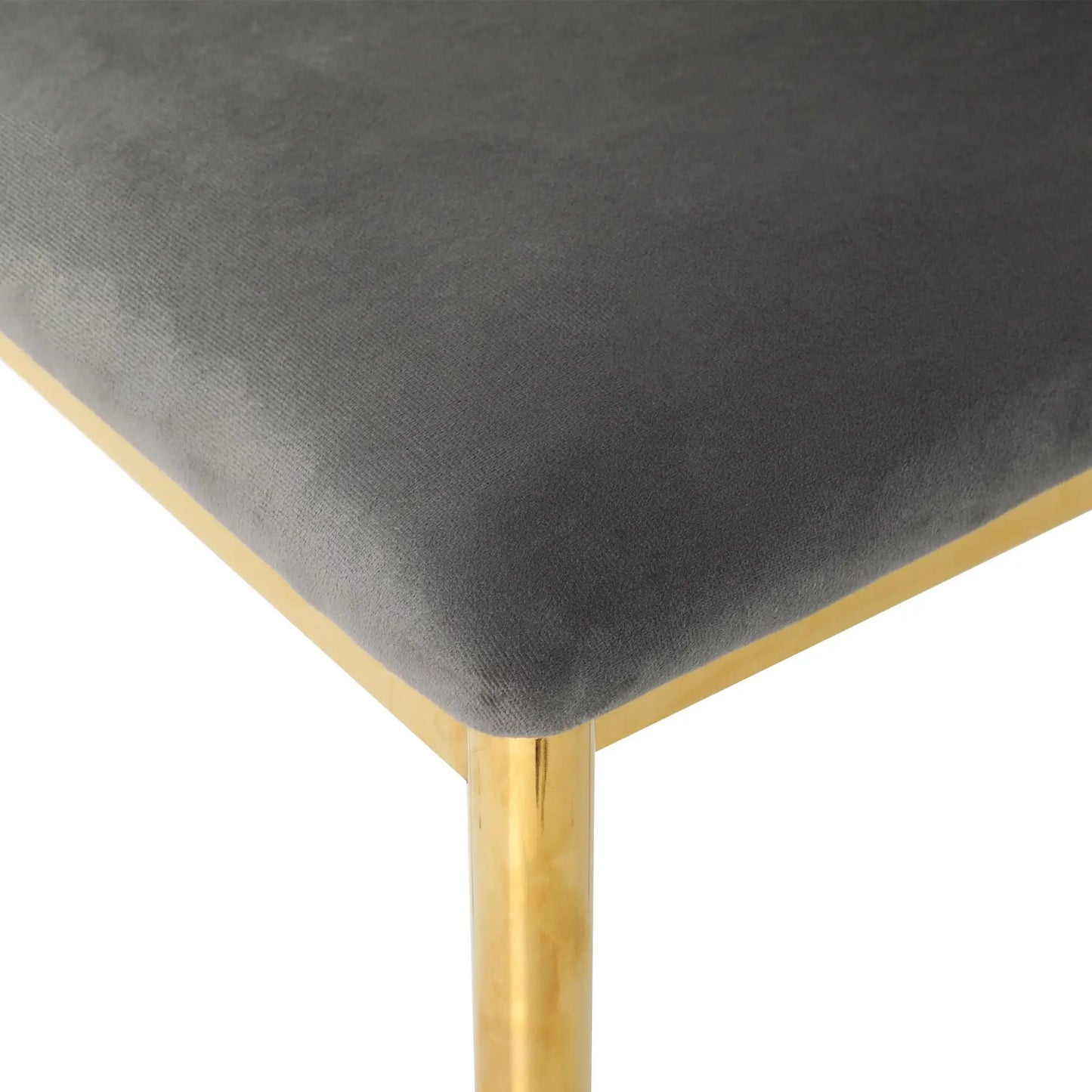 Modern dining chair with grey fabric upholstery, light wood frame, and gold legs on Tampa Home & Garden Store
