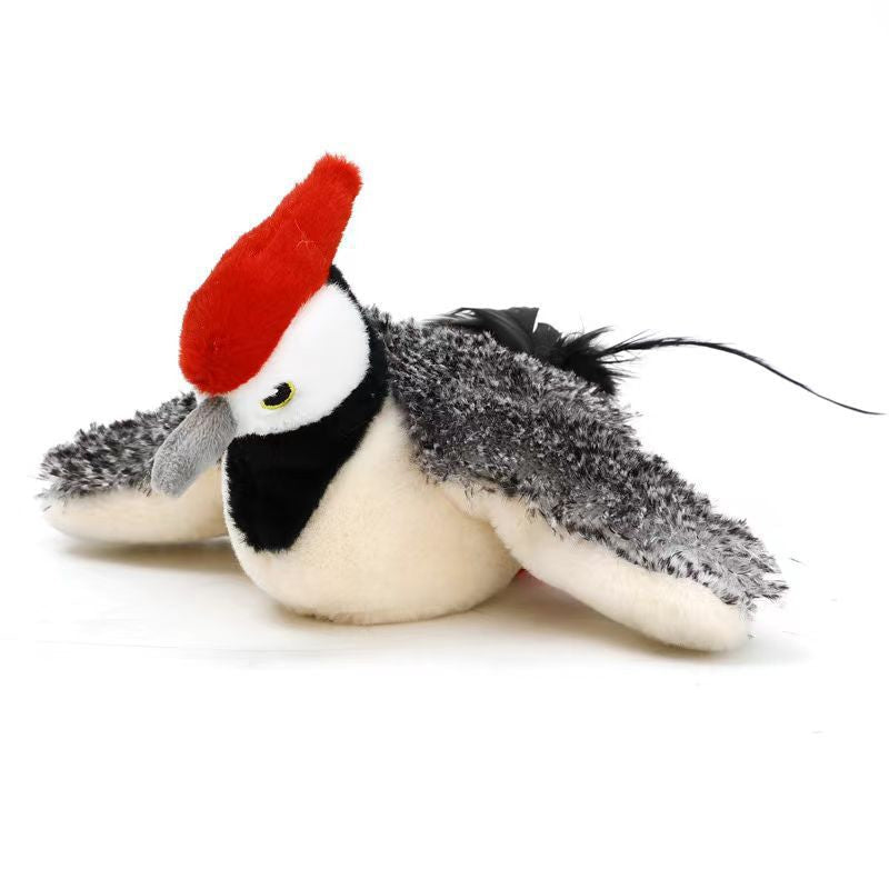 Pet plush toy winged bird from Sell My Stuff, with red crest, grey beak, black/white body on Tampa Home & Garden Store