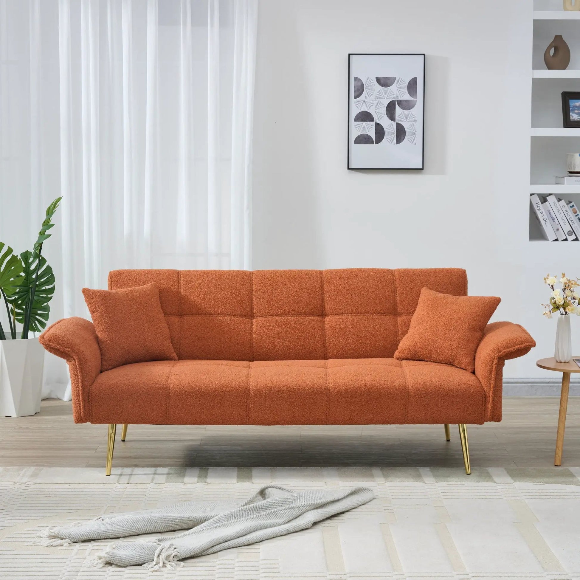 Convertible futon sofa bed in orange fabric with folding armrests by Unique Piece Furniture on Tampa Home & Garden Store